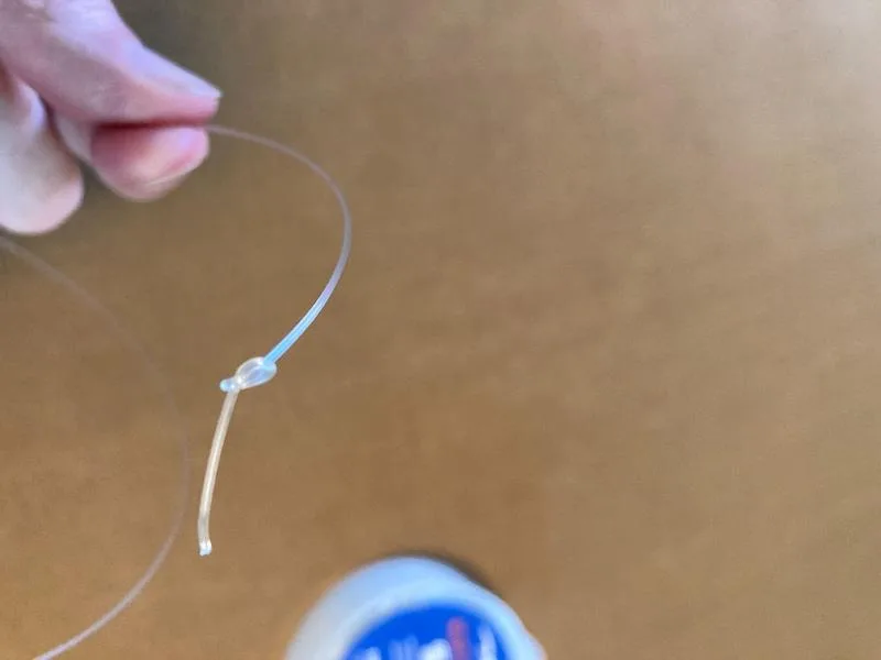 3. Tie Knot in Ukulele String Tie Knot in Ukulele String