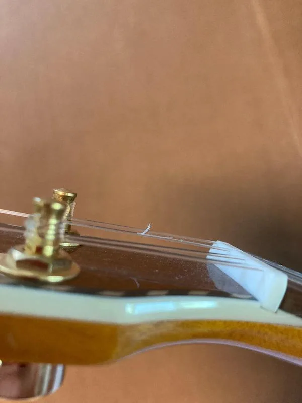 Frayed Ukulele String Frayed Ukulele String